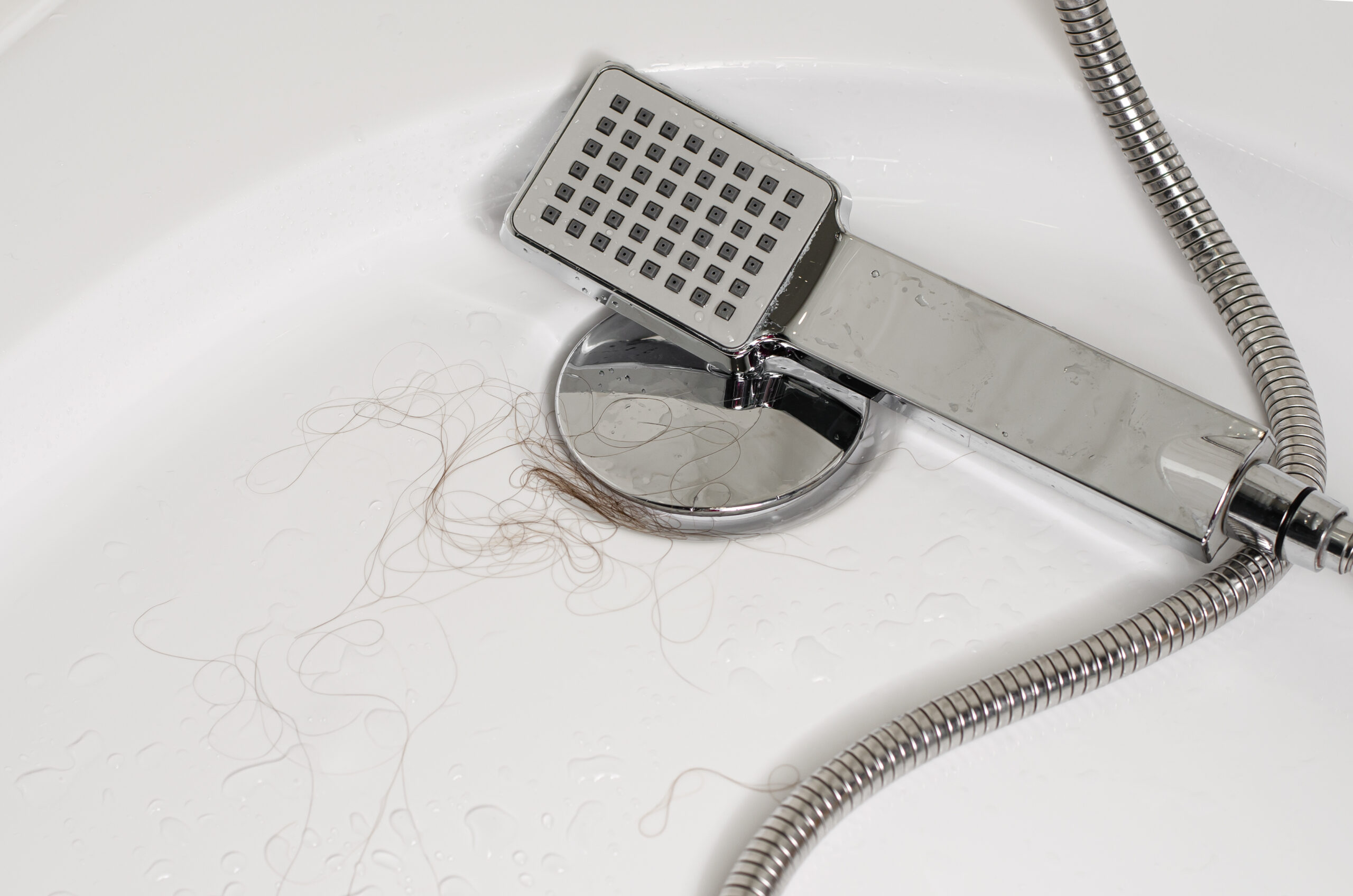 how to remove bathtub drain cover